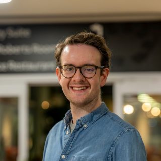 Headshot image of Matthew Grey