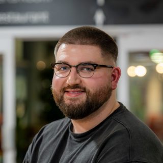 Headshot image of Max Ellis